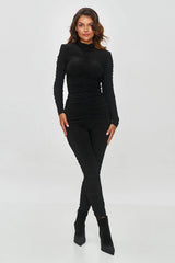 combinaison noire ajustée manches longues maille stretch col montant fronces sculptantes moulante cheville brillante lisse confortable sophistiquée élégante