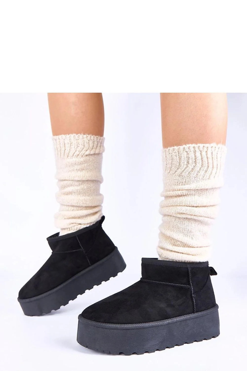 bottes neige noires plateforme fourrure doublure chaude semelle crantée antidérapante suédine slipon cheville profilée confort urbain