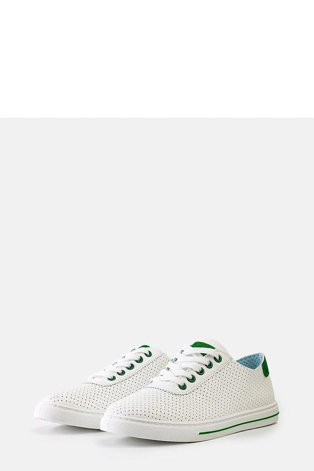 Sneakers basses pour femmes cuir perforé blanc détails verts style moderne confortable occasion quotidienne