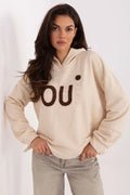 sweatshirt femme oversize beige crème molleton coton polyester manches longues capuche épaules tombantes appliqué chenille marron broderie confortable