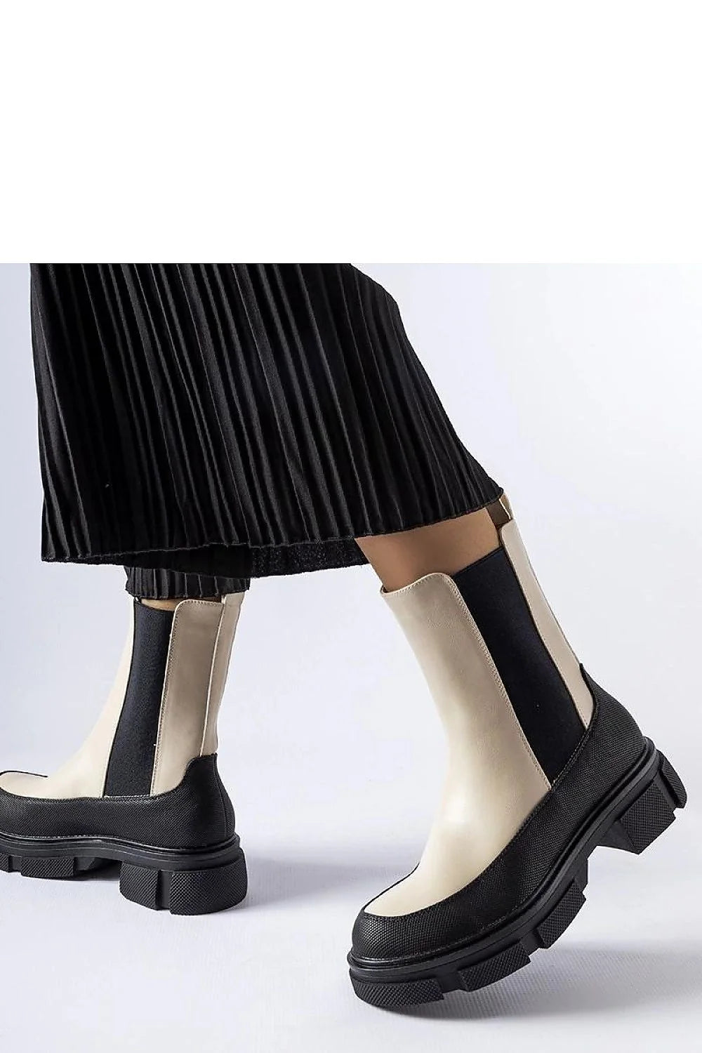 Bottes pour femmes design moderne chic bicolore beige noir Chelsea style semelle épaisse elasticité latérale protection mi-mollet finitions élégantes occasion多种