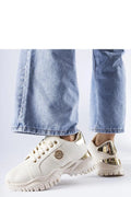 Baskets femme modernes élégantes style urbain sportif cuir synthétique blanc doré semelle épaisse lacets blancs logo doré confortable