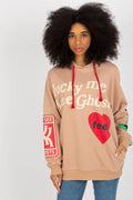Sweatshirt Fancy Femme Streetwear Coupe Oversize Capuche Manches Longues Imprimés Élégants Tissu Doux Confort Mode Urbaine
