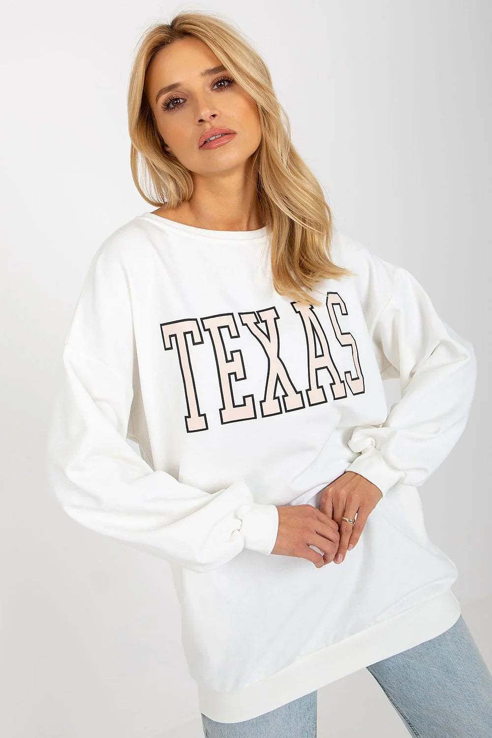 sweatshirt oversize femme long boxy encolure ronde manches ballon molleton coton épais blanc cassé lettrage TEXAS rose pâle poignets côtelés