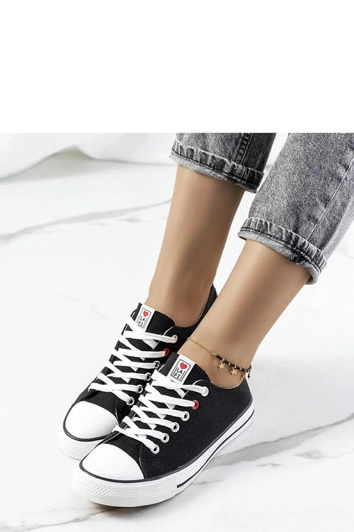 Baskets classiques noires blanches Kolind tige en toile semelle caoutchouc lacets blancs logo femme