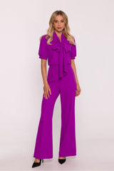 combinaison pantalon fuchsia lavallière nouée manches bouffantes poignets froncés taille haute blousante jambes larges évasées fluide chic élégant