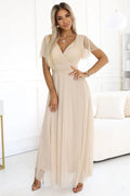 robe longue élégante beige maille élastique Numoco cérémonie mariage communion baptême soirée décolleté V croisé taille cintrée manches volantées tulle