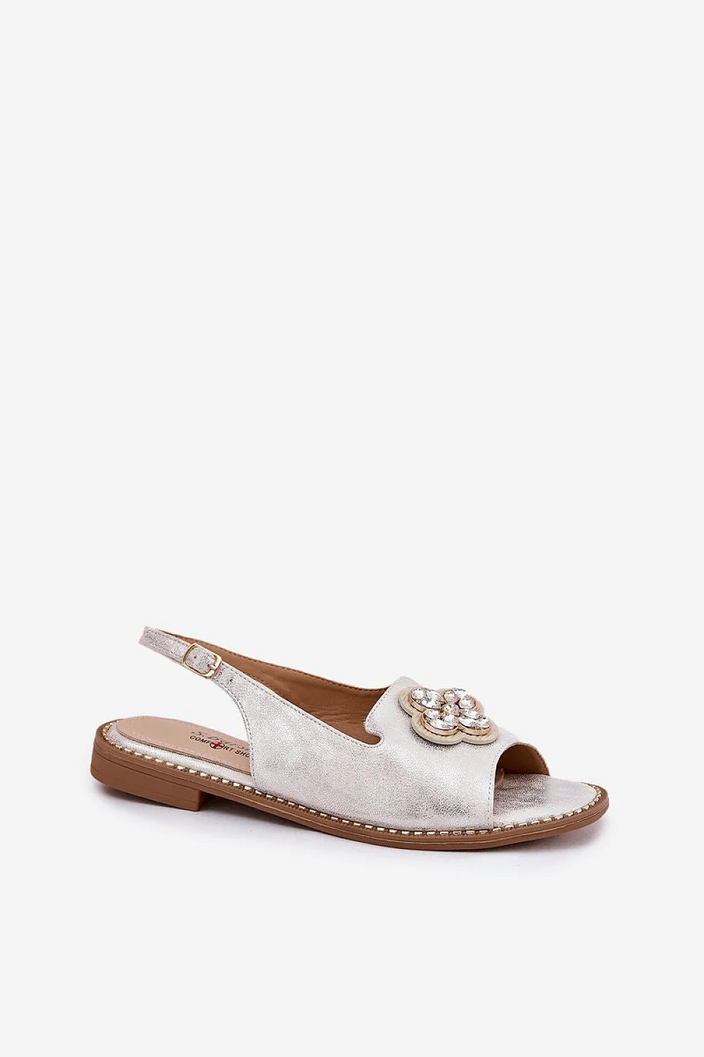Sandales Step in style pour femmes cuir artificiel argenté décoration florale pierres brillantes confort élégance occasions estivales mode taille ajustable boucle métallique finitions soignées style décontracté chic
