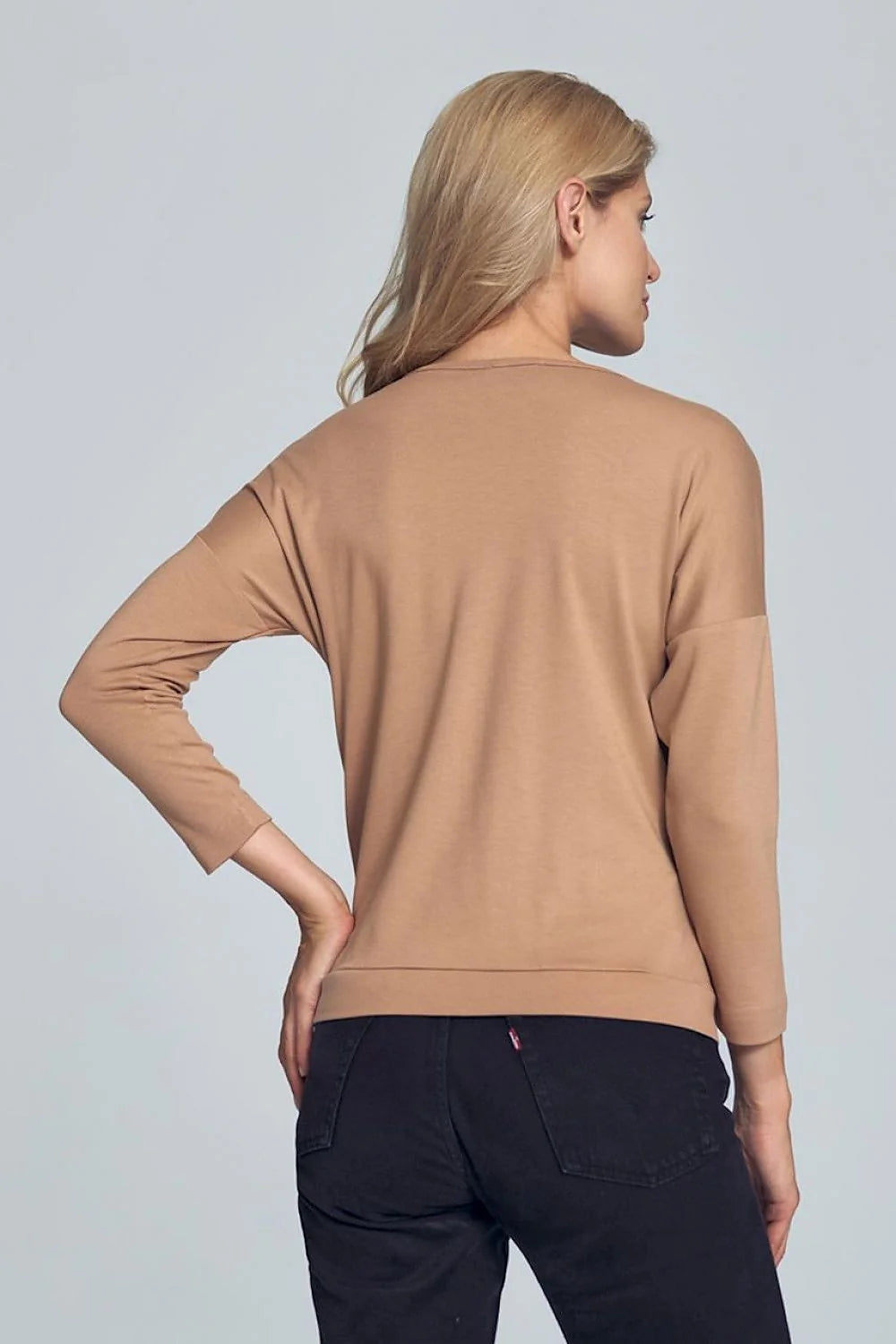 Haut féminin blanc en polyester viscose élégant manches longues encolure V pour look chic