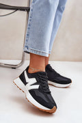 Chaussures de sport pour femmes baskets noires détails blancs semelle marron clair style sportif