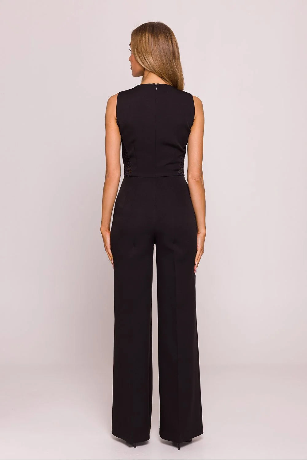 combinaison élégante femme noire dentelle géométrique panneaux transparents taille ajustable boucle métallique ceinture cintrée sans manches palazzo fluide