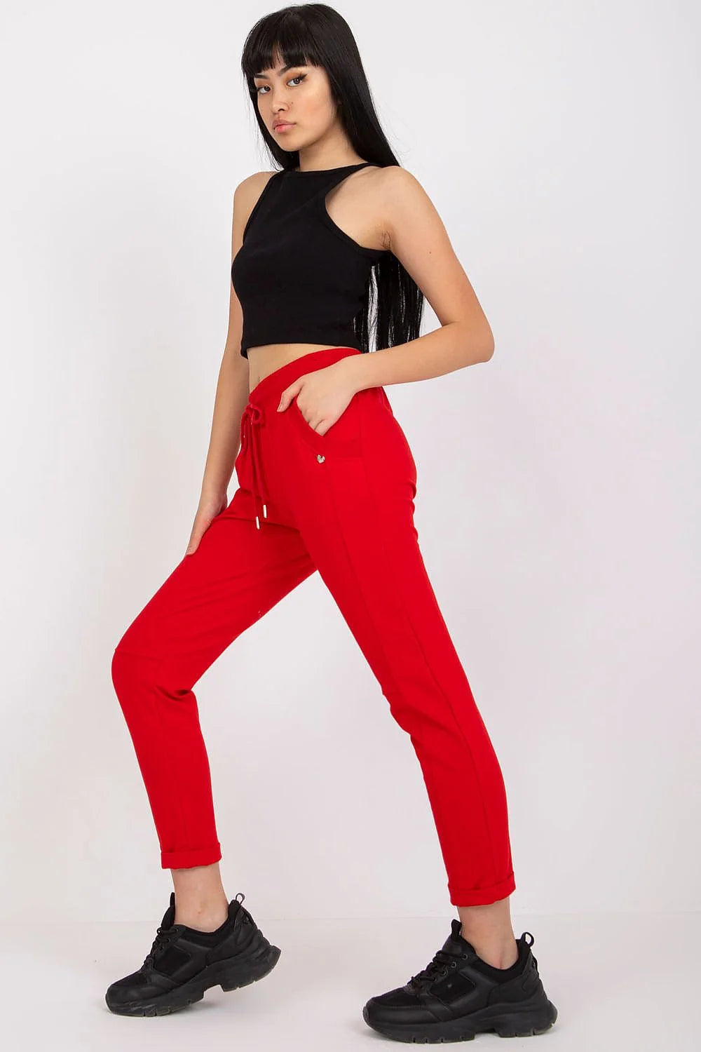pantalon survêtement femme fuchsia vif taille haute élastique cordon serrage embouts métalliques slim fuselé cheville poches latérales stretch