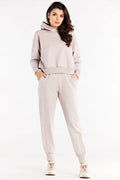 Ensemble détente femme hoodie et pantalon survêtement Infinite You coton élasthanne beige clair coupe ample manches longues poches latérales ceinture élastique