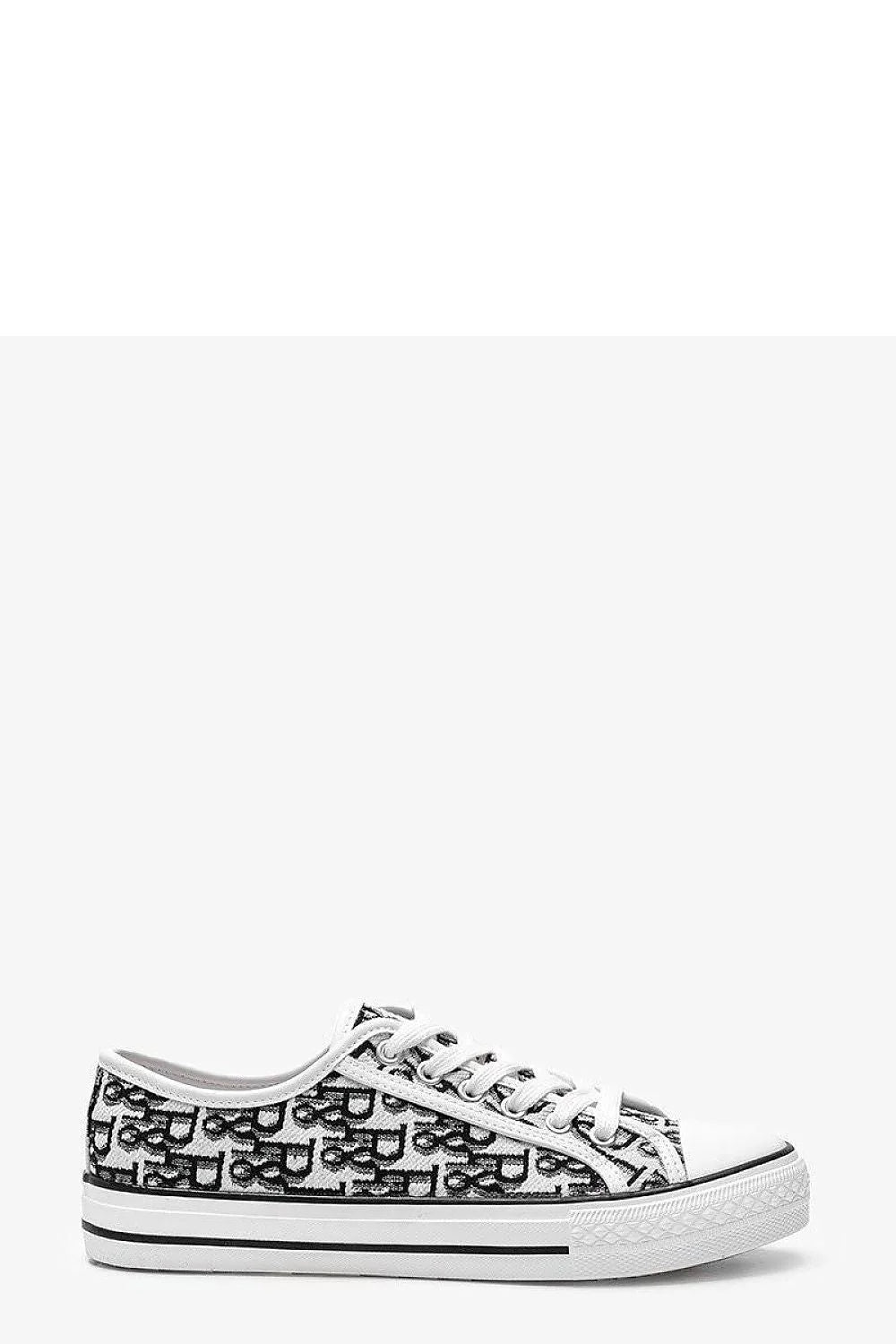 Baskets pour femme modernes design épuré motif graphique blanc noir lacets ajustables tige basse semelle caoutchouc respirante confortable style casual urbain été automne hiver