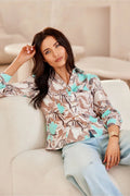 Chemise féminine élégante en polyester motif floral beige marron blanc turquoise manches longues col à revers boutons dorés