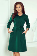 Robe élégante polyester vert bouteille évasée avec ceinture intégrée et poches pour femmes modernes