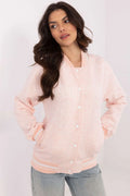Veste bomber pour femme style universitaire sportif couleur rose pâle manches longues col montant fermeture boutons pression