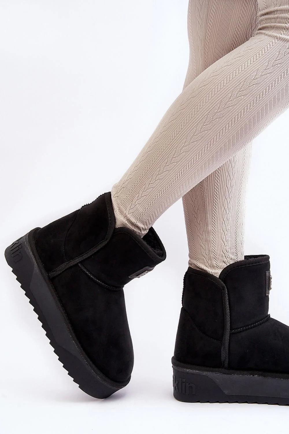 Bottes de neige pour femmes vegan imperméables fourrure synthétique confort thermique design moderne style minimaliste hauteur 14cm semelle antidérapante
