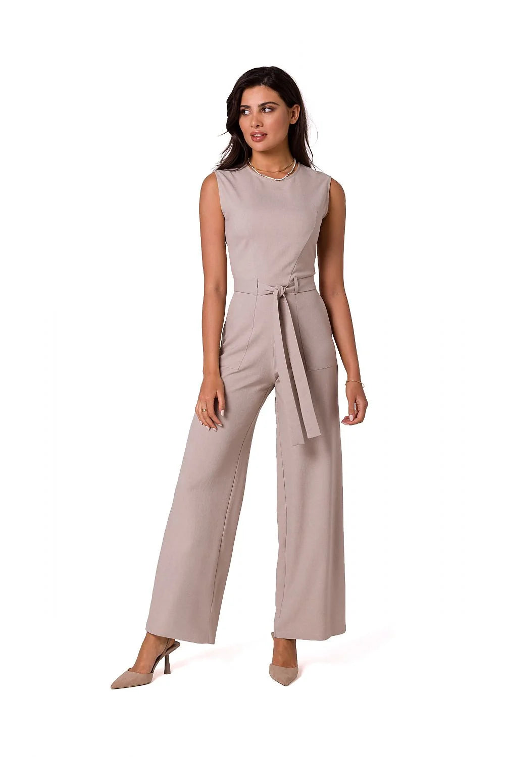 Combinaison élégante sans manches pour femme, design moderne, ceinture à nouer, poches latérales, tissu léger, couleur rose pâle, taille ajustable, occasion多様