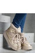 Bottes de neige Solea pour femme, design moderne, beige, fourrure synthétique, cuir écologique, semelle caoutchouc, lacets larges, protection cheville, style urbain, froid intense, mode hiver