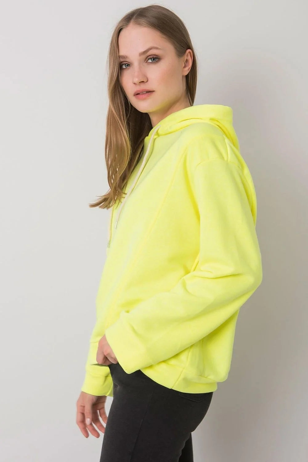 hoodie femme jaune fluo coton elasthanne molleton doux coupe ample épaules tombantes manches longues capuche doublée cordon blanc réglable