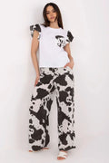 Ensemble mode féminin chemisier manches courtes volants pantalon large taille haute élastique motif animal blanc noir femme