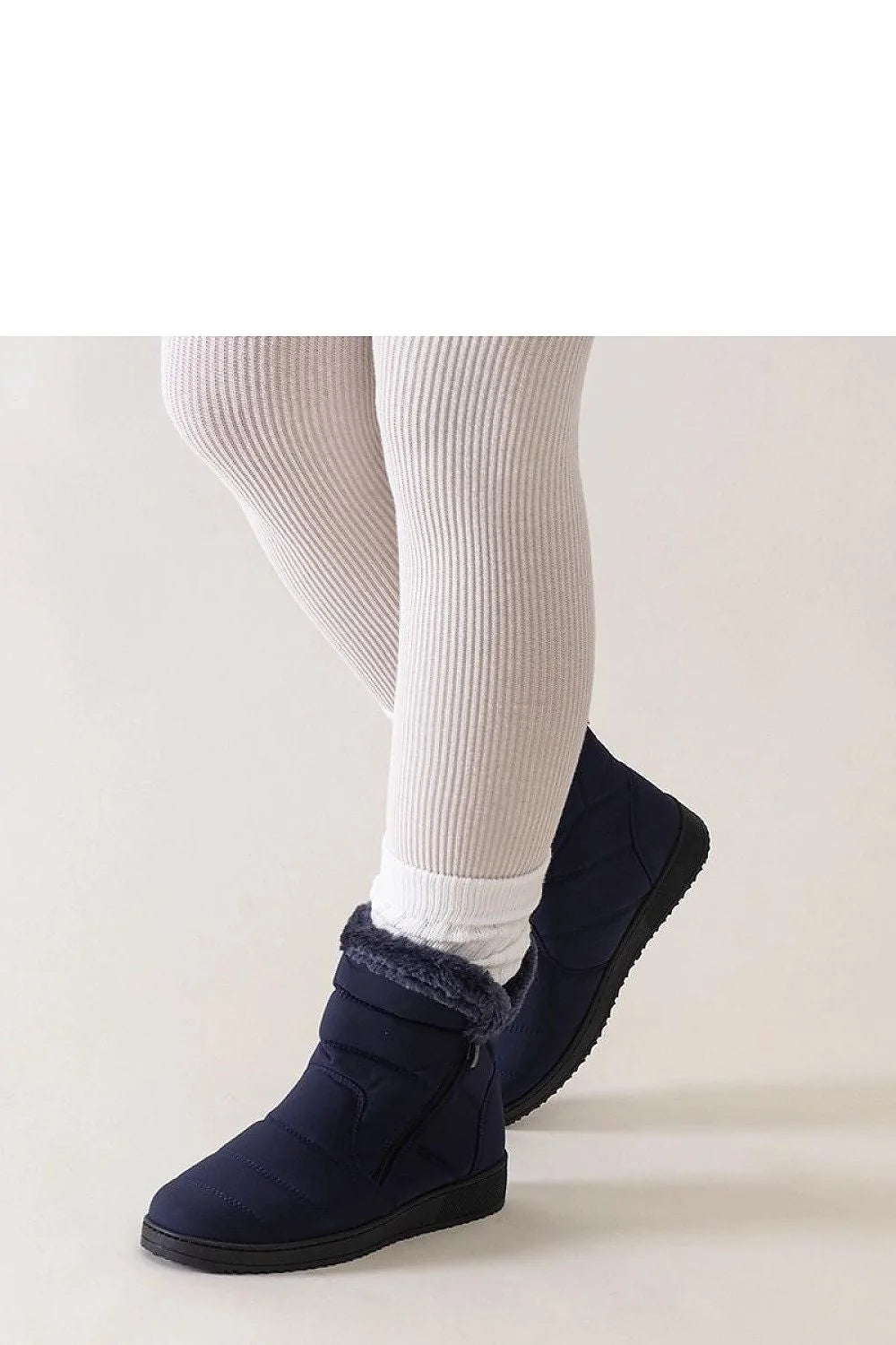 bottines neige femme matelassées bleu marine fausse fourrure doublure chaude semelle caoutchouc antidérapante fermeture éclair latérale