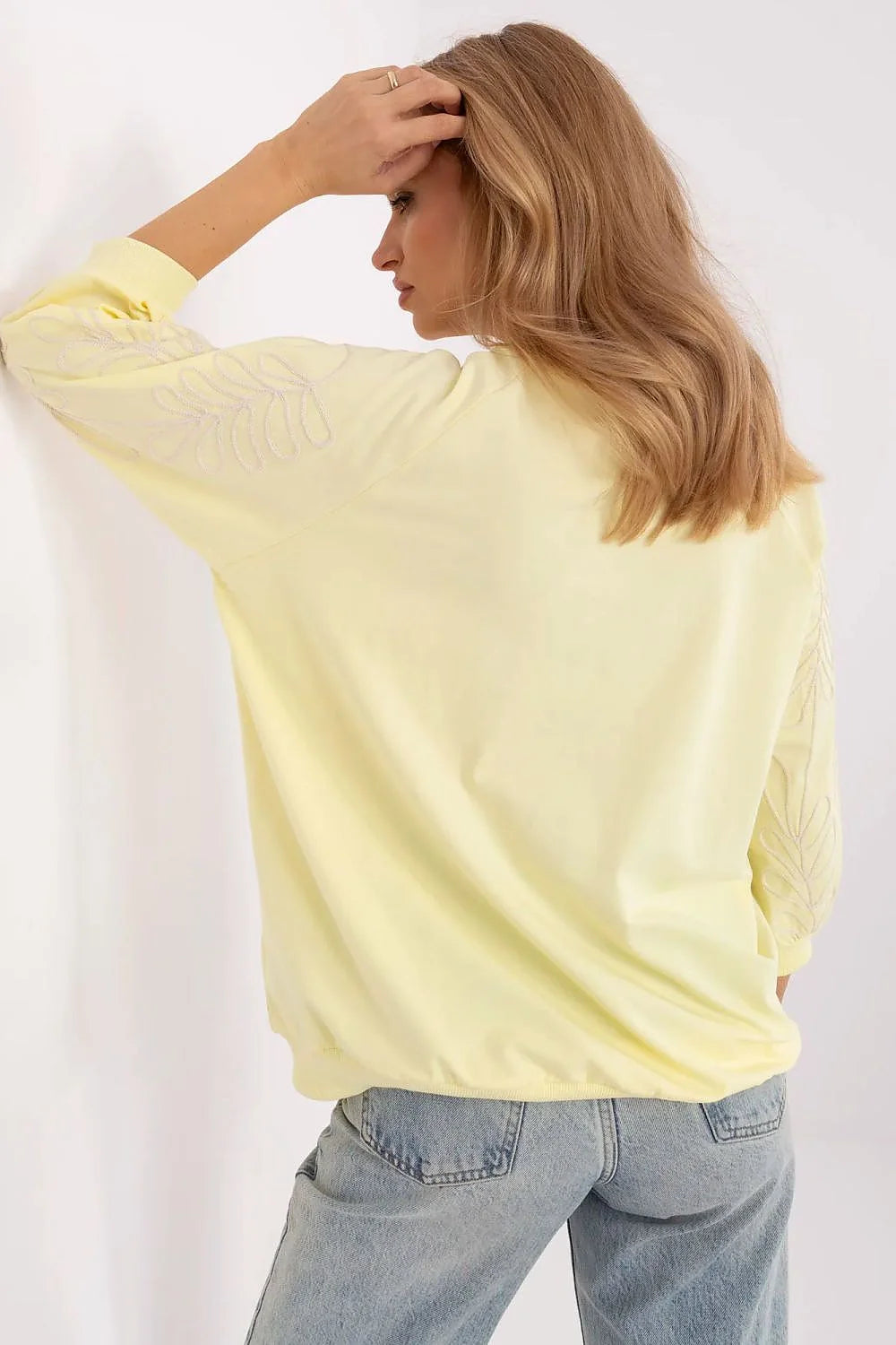 Sweatshirt femme casual style moderne coton manches raglan coupe ample pochette kangourou élégance subtile多 saison décontracté urbain