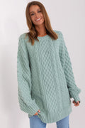 pull long oversize maille torsadée épaisse moelleuse manches longues encolure ronde ourlet côtes poignets hanches bleu doux cosy