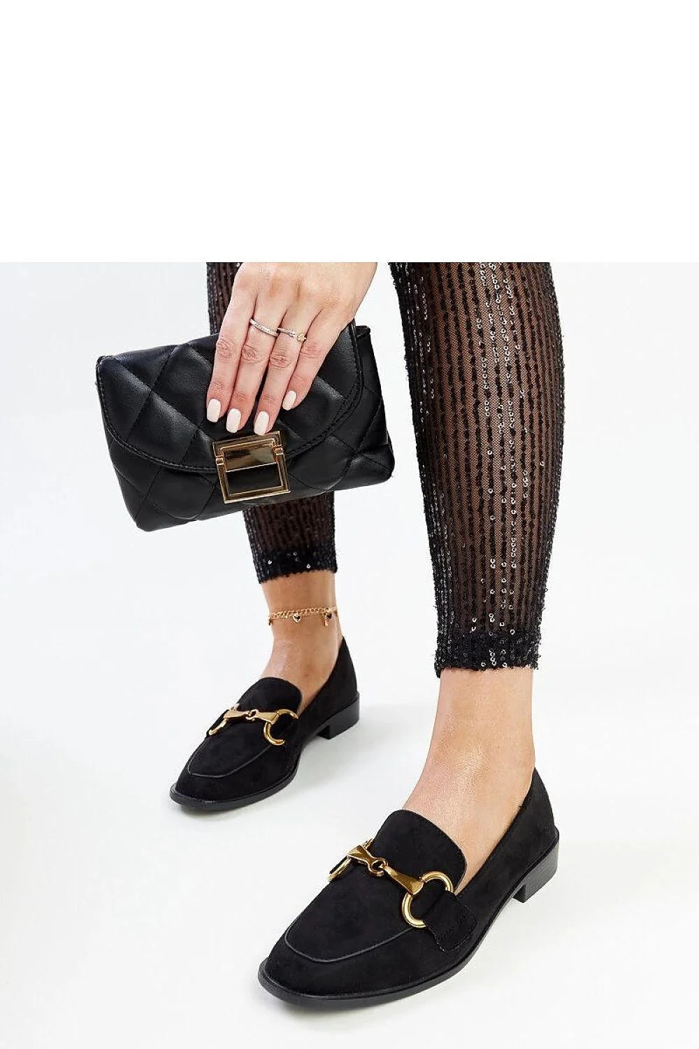 Moccasins femmes classiques élégants cuir noir bout en amande détails métalliques dorés confortables occasionnels
