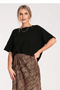 blouse top oversize noir coupe boxy courte manchescourtes larges encolurearrondie maillelegere souple fluide viscose acrylique laine casualchic minimaliste contemporain polyvalent