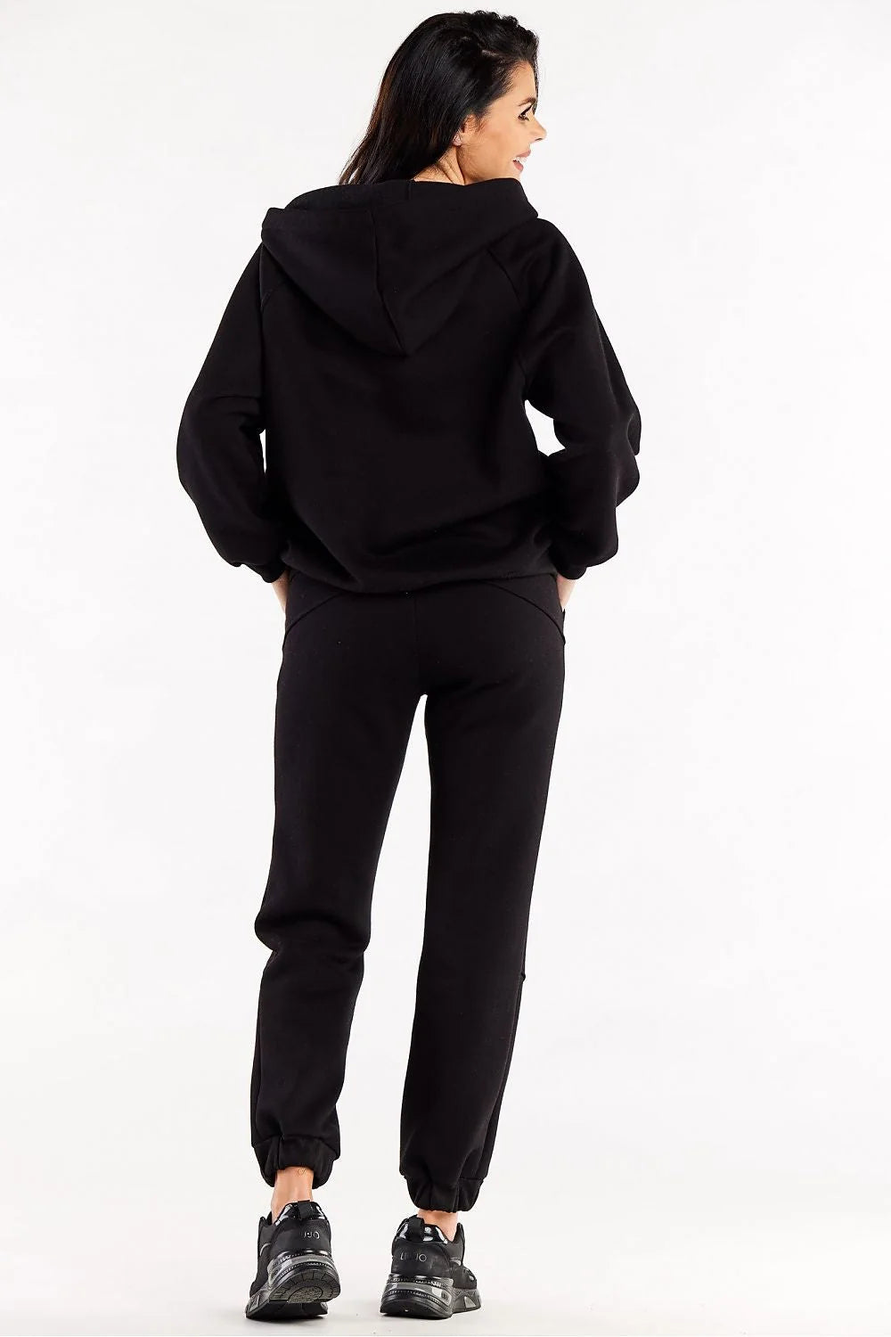 Survêtement complet moderne minimaliste noir pour femme, pantalon ample élastique, sweat à capuche, confort optimal, style décontracté, occasion sport et quotidienne
