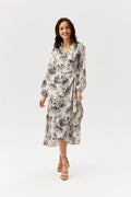 robe portefeuille midi femme manches longues ballon col plongeant imprimé floral noir croquis fond beige ceinture nouée taille
