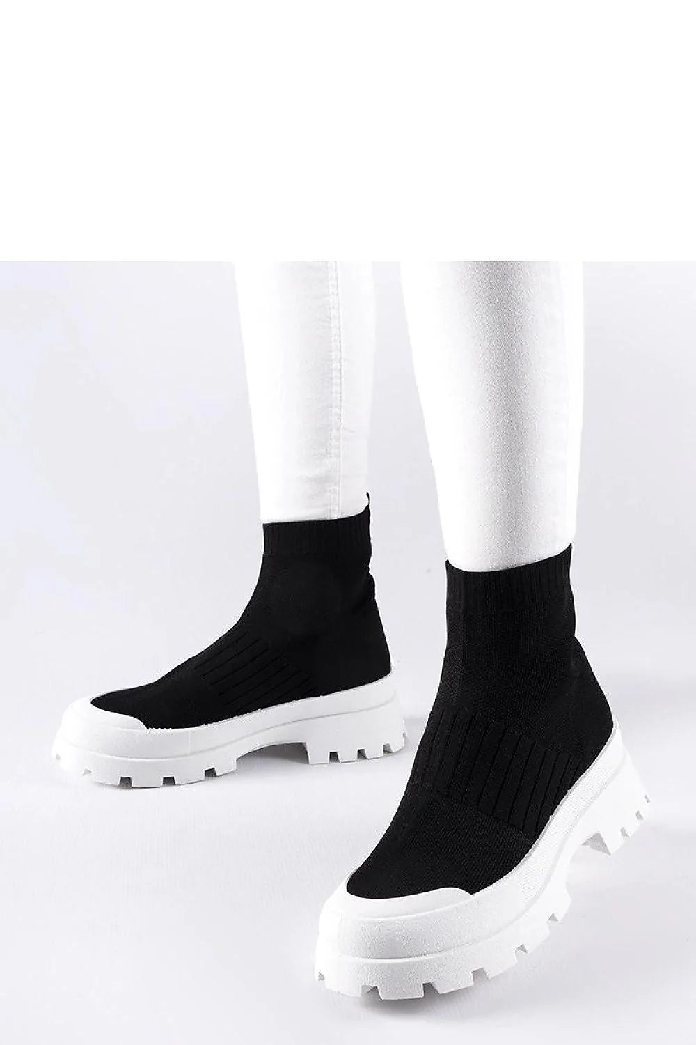 Bottines pour femmes modernes design contemporain noir et blanc tige élastique semelle épaisse sans lacets
