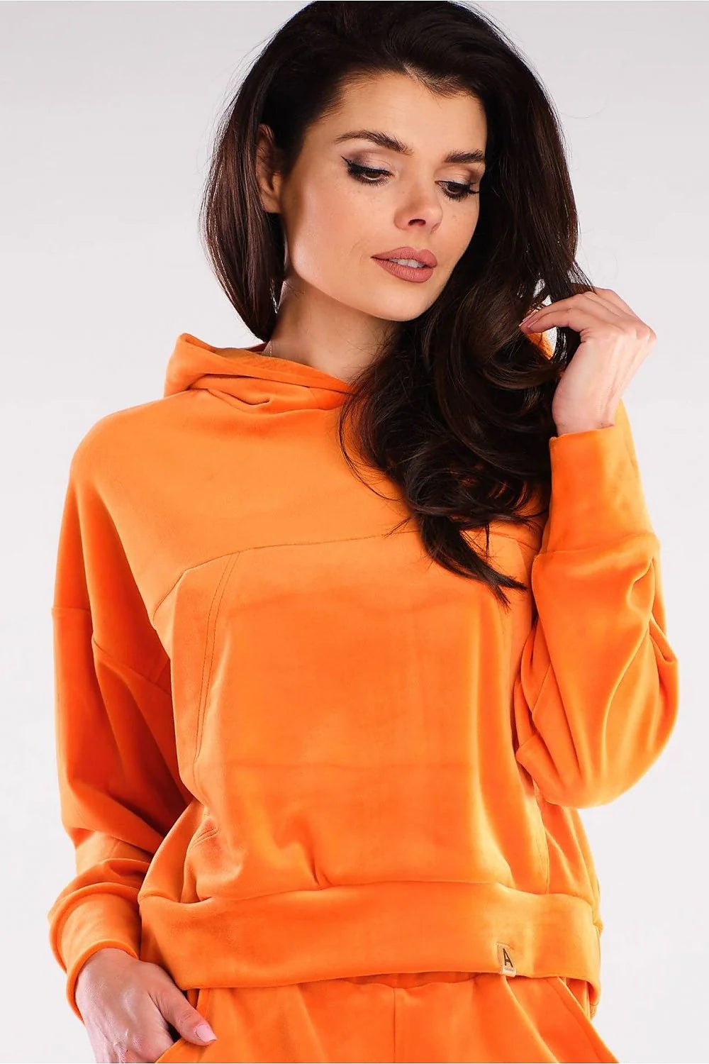 Sweatshirt femme velours rose vif style décontracté chic confortable coupe ample capuche poches pratiques