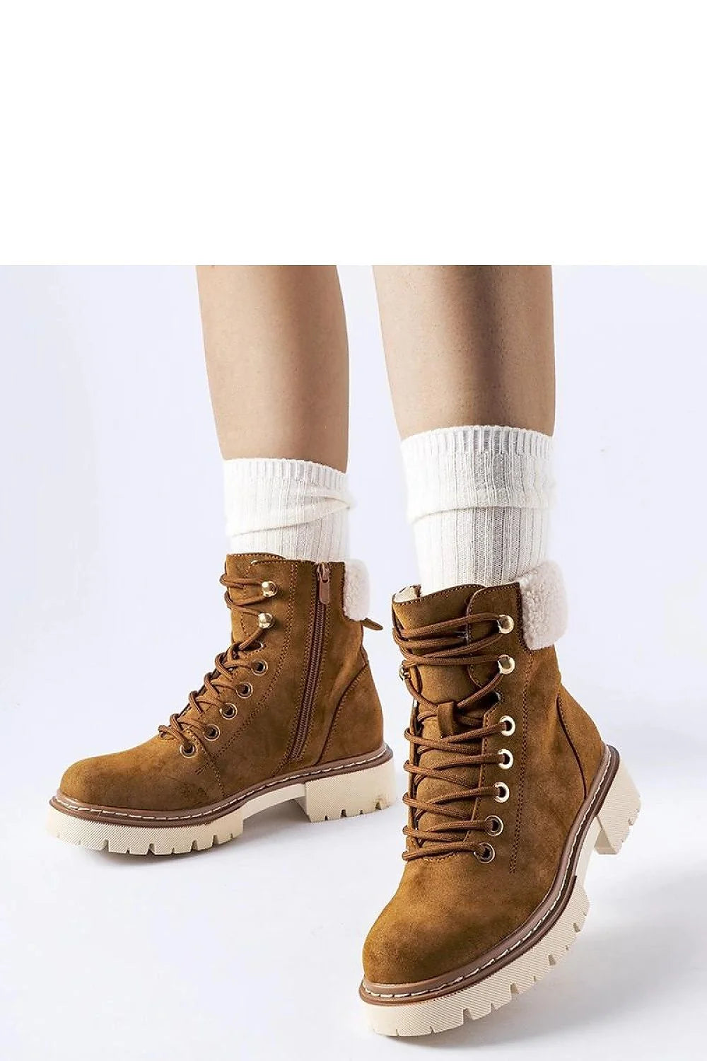 Bottes trappeur Solea pour femmes design fonctionnel élégant couleur brun caramel doublure fourrure synthétique semelle caoutchouc durable style casual chic idéales pour l'hiver