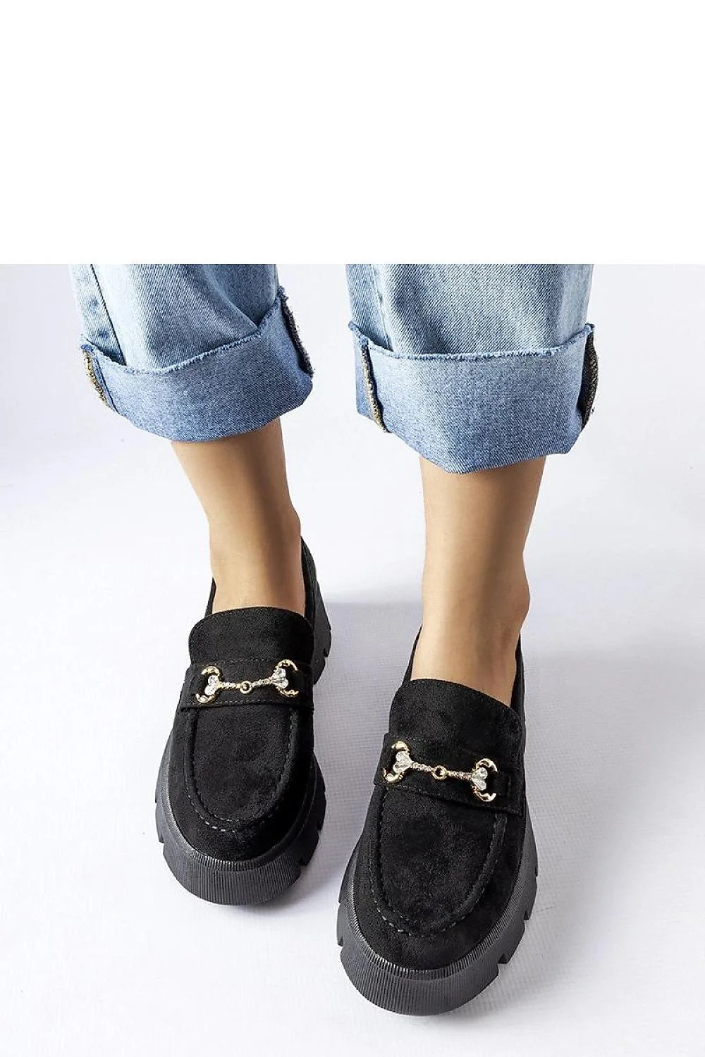 Mocassins femmes élégance moderne couleur noire tige daim nappa semelle épaisse dorée métal finitions précises occasion versatile
