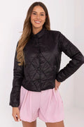 Veste matelassée noire pour femme style moderne coupe classique manches longues col rond résistante au vent polyvalente automne-hiver-printemps tissu polyester finitions élégantes occasion quotidienne travail sortie