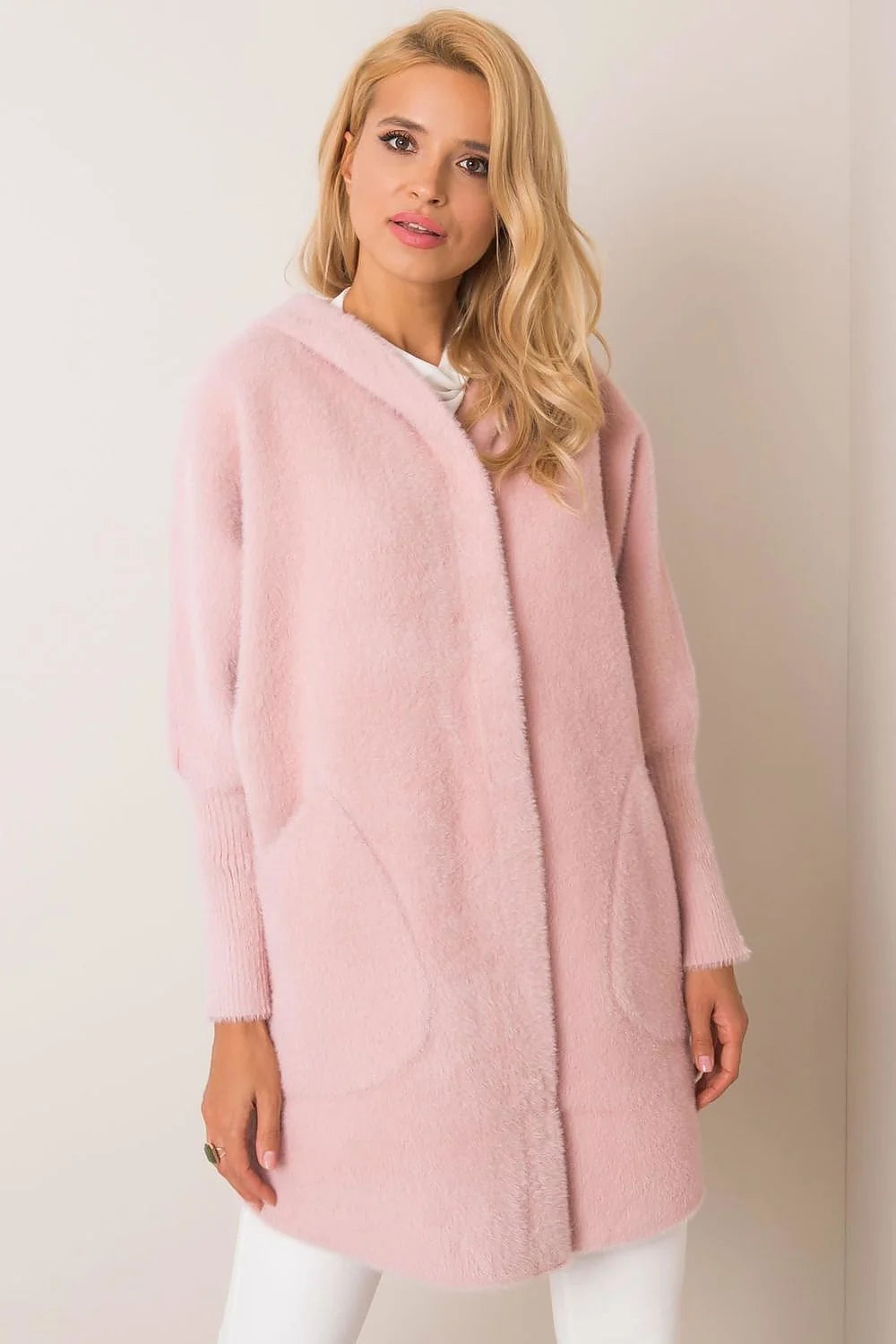 Manteau femme design moderne coupe droite couleur rose pastel matières douces automne hiver élégance confort