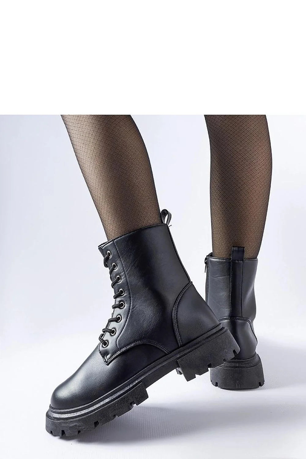 Bottes trappeur Solea femmes cuir noir design robuste style moderne talon plat semelle caoutchouc fermeture éclair