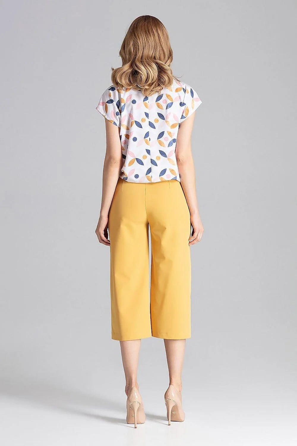 Pantalon jaune vif femme en tissu lisse élégant moderne taille haute coupe évasée chic