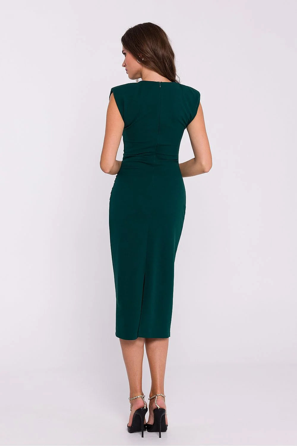 Robe tube émeraude maille stretch ajustée coupe midi sans manches épaulettes géométriques fente latérale robe élégante femme