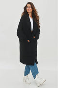 cardigan long oversize confortable élégant doux cosy noir femme maille épaisse côtelée col châle manches larges poches plaquées longueur midi