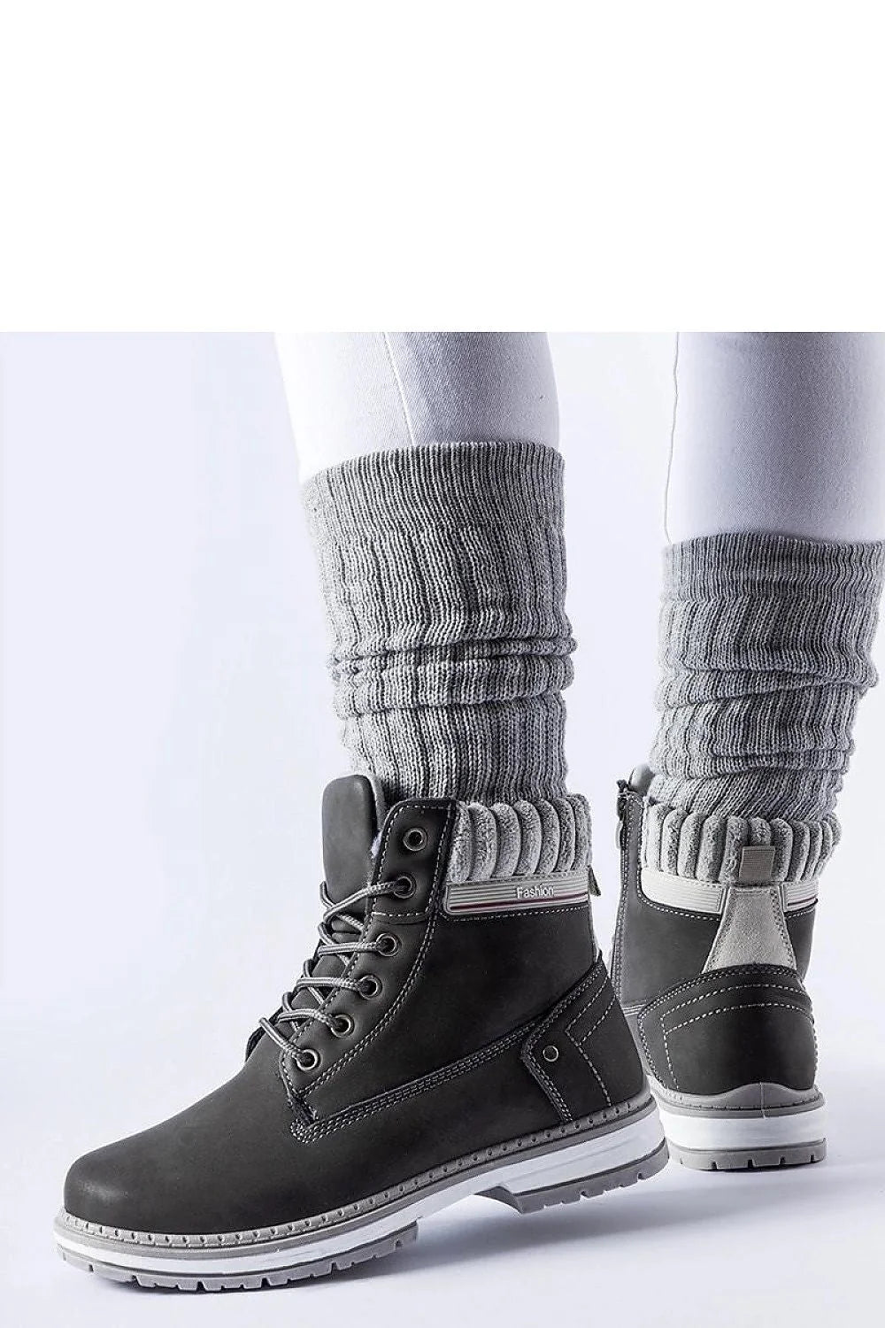 Bottes Solea femmes style moderne tige haute cuir noir doublure tricot fermeture éclair lacing métal semelle blanche crantée