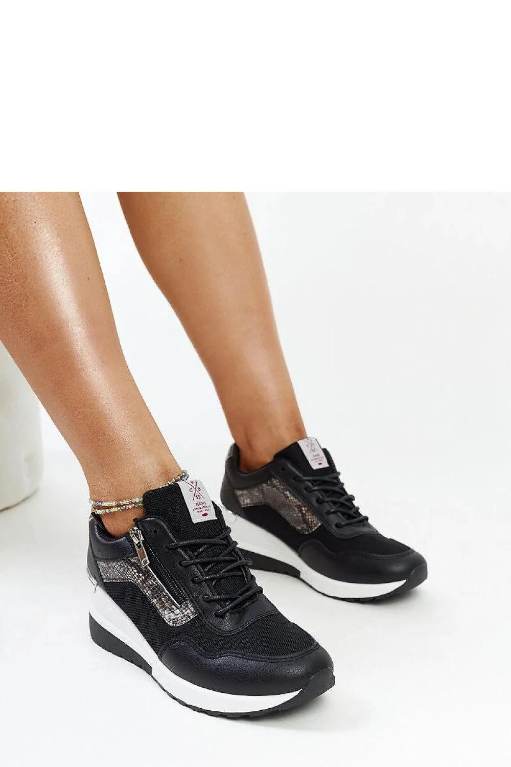 baskets femme sneakers compensées noires bicolores plateforme semelle crantée tige cuir synthétique mesh empiècements imitation python