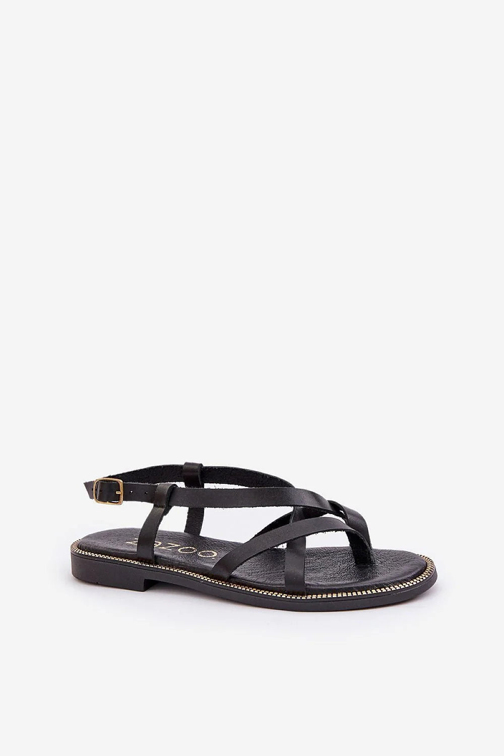 sandales plates cuir naturel noires brides croisées bride cheville réglable boucle dorée semelle caoutchouc surpiqûre soignée minimalistes confortables chic estivales