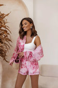 Ensemble féminin motif floral couleurs pastel été 2023 mode veste short tissu léger respirant tendance chic