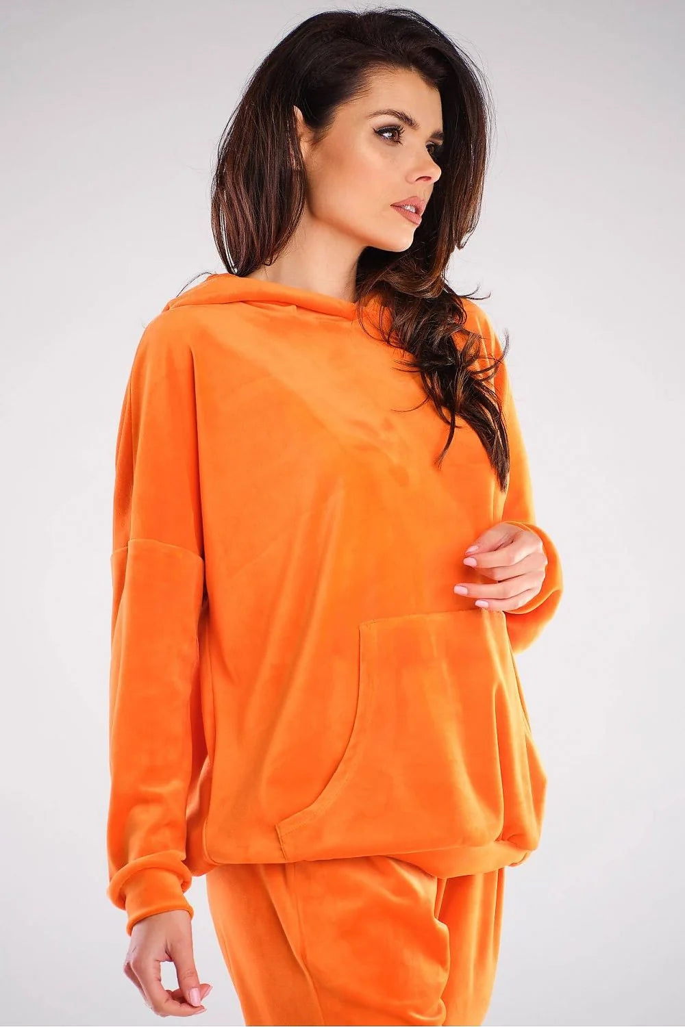 Sweatshirt en velours orange vif confortable ample avec capuche poche kangourou pour femmes modernes