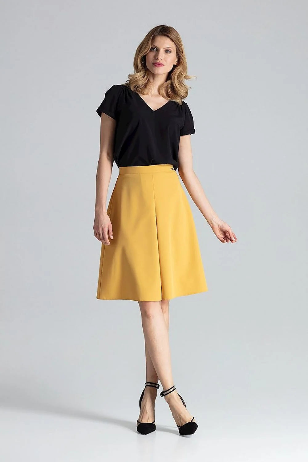jupe trapèze midi taille haute ajustable mi genou évasée plis contrastés jaune moutarde tissu structuré tombé net élégant contemporain professionnel