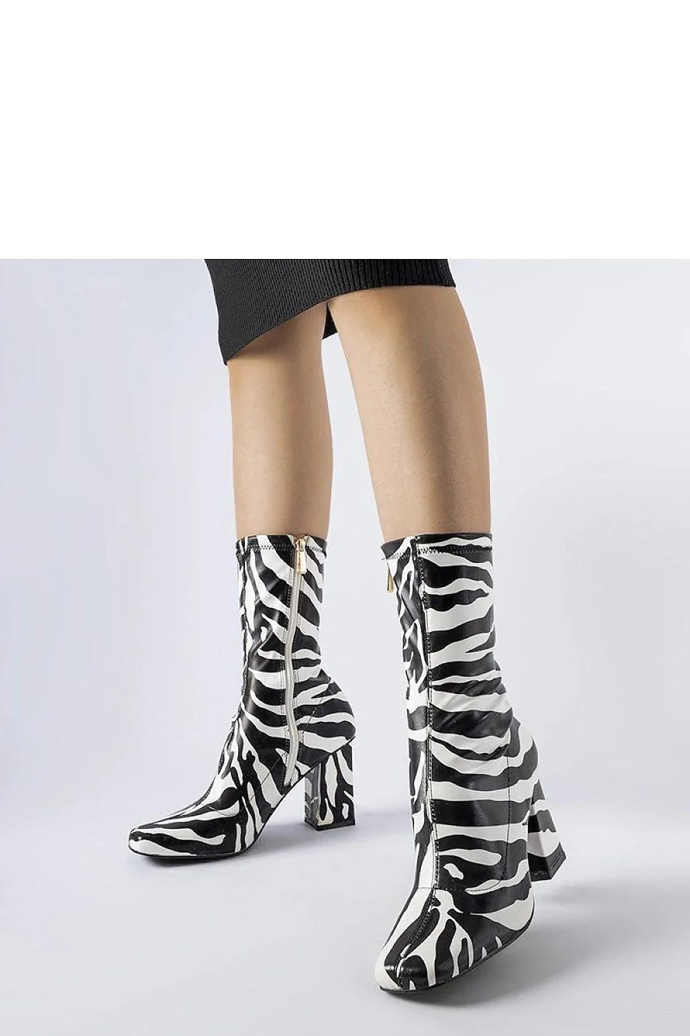 bottes Solea zébré imprimé noir blanc verni synthétique tige ajustée mi mollet talon bloc moyen fermeture éclair dorée rétro chic